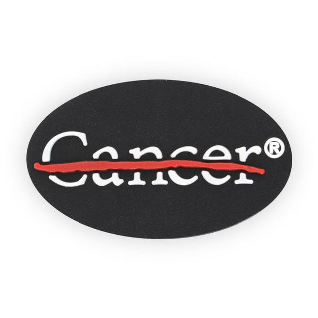 Black shoe charm featuring the white cancer strikethrough logo.