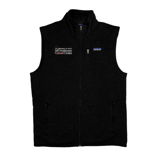 Black Patagonia sweater vest with full zip featuring the white MD Anderson logo on one side and the Patagonia logo on the other side.